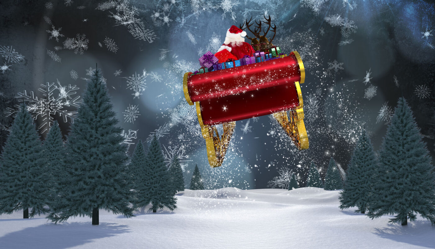 47308126 - santa flying his sleigh against blue snow flake pattern design
